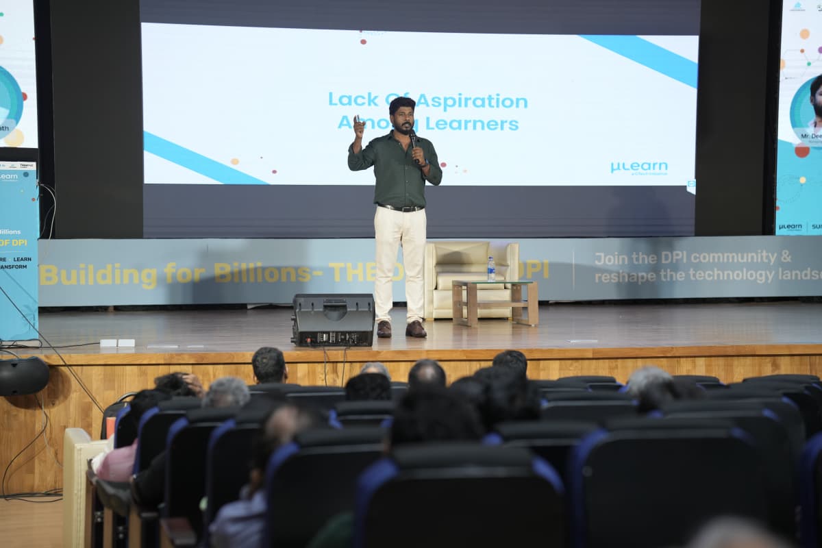 Audience of developers and entrepreneurs listening to a session on India Stack