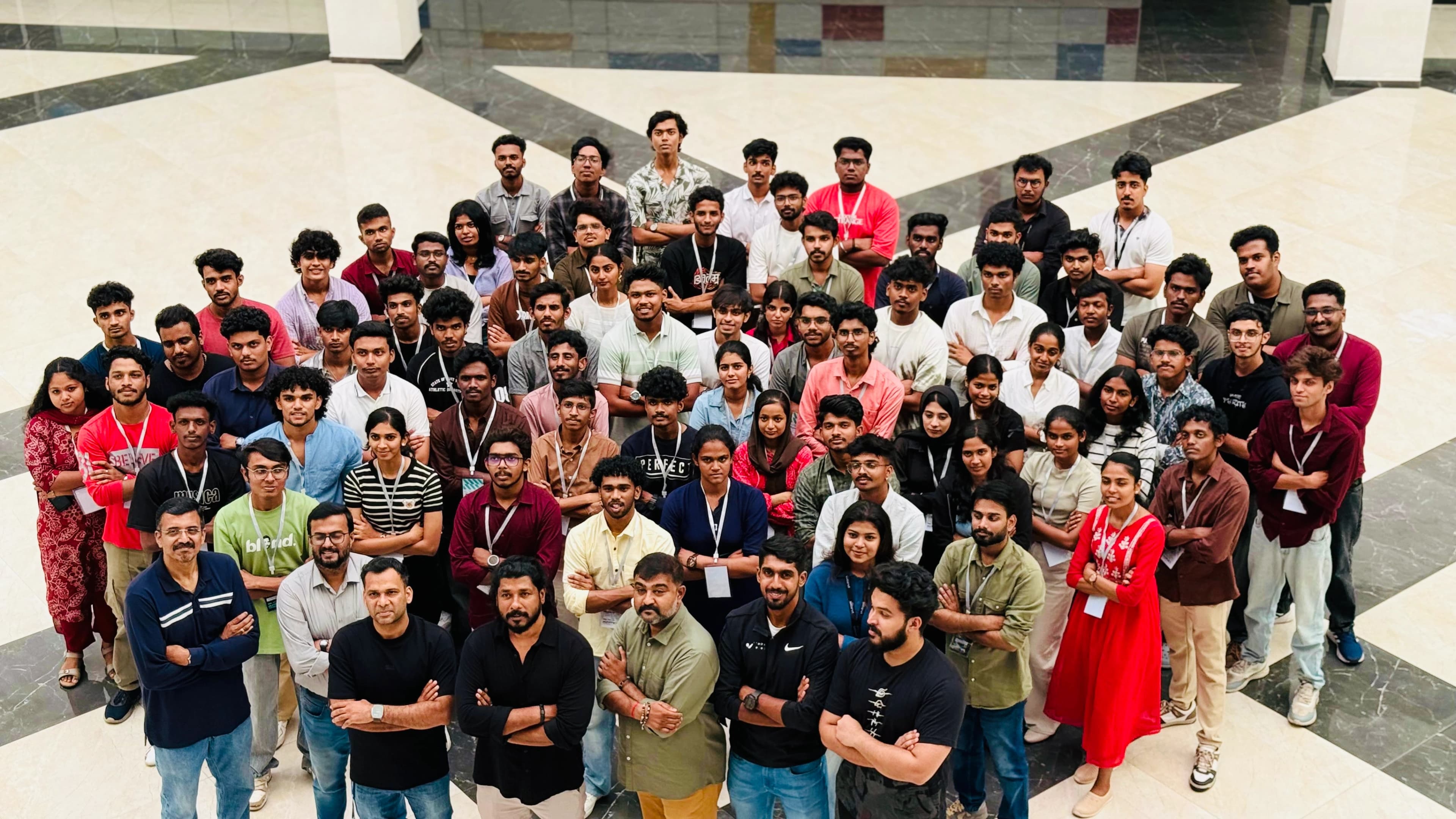 Mutate hackathon main stage with participants ready to innovate